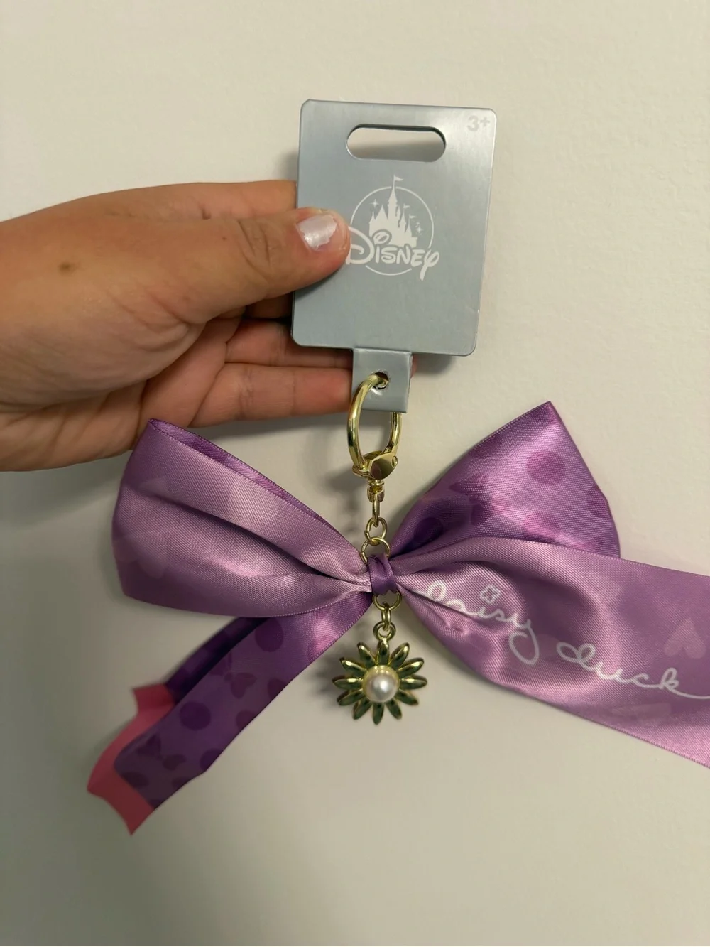 Disney Lavender Satin Bow Gold Daisy Pearl Charm keychain